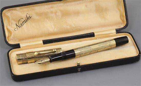 A cased Namiki 14k rolled gold fountain pen, 13cm